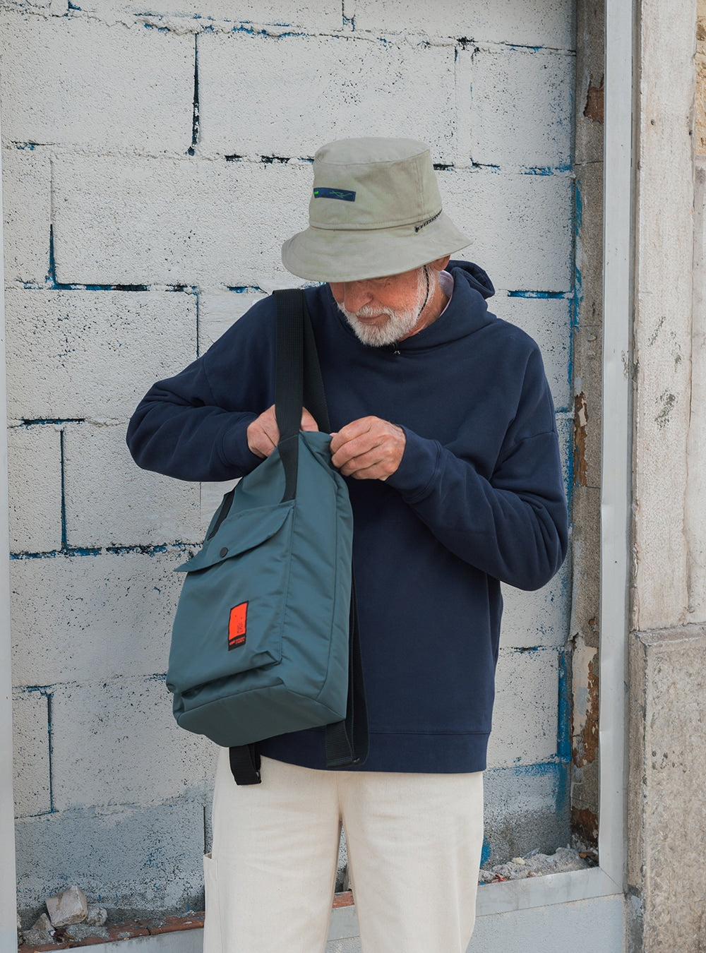 Recycled convertible backpack